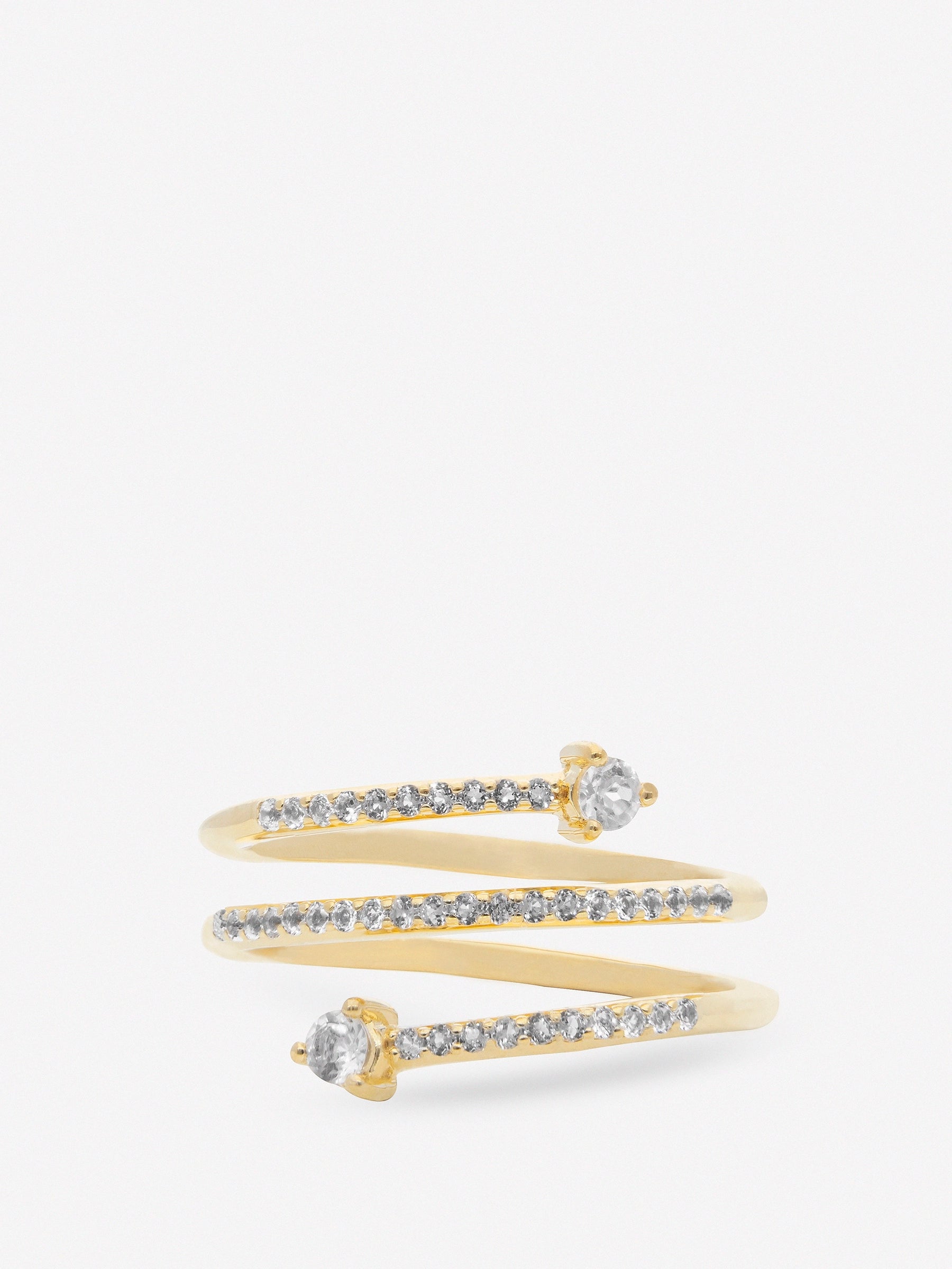Anillo de plata abierto trepador en espiral con detalles de topacios blancos chapado en oro