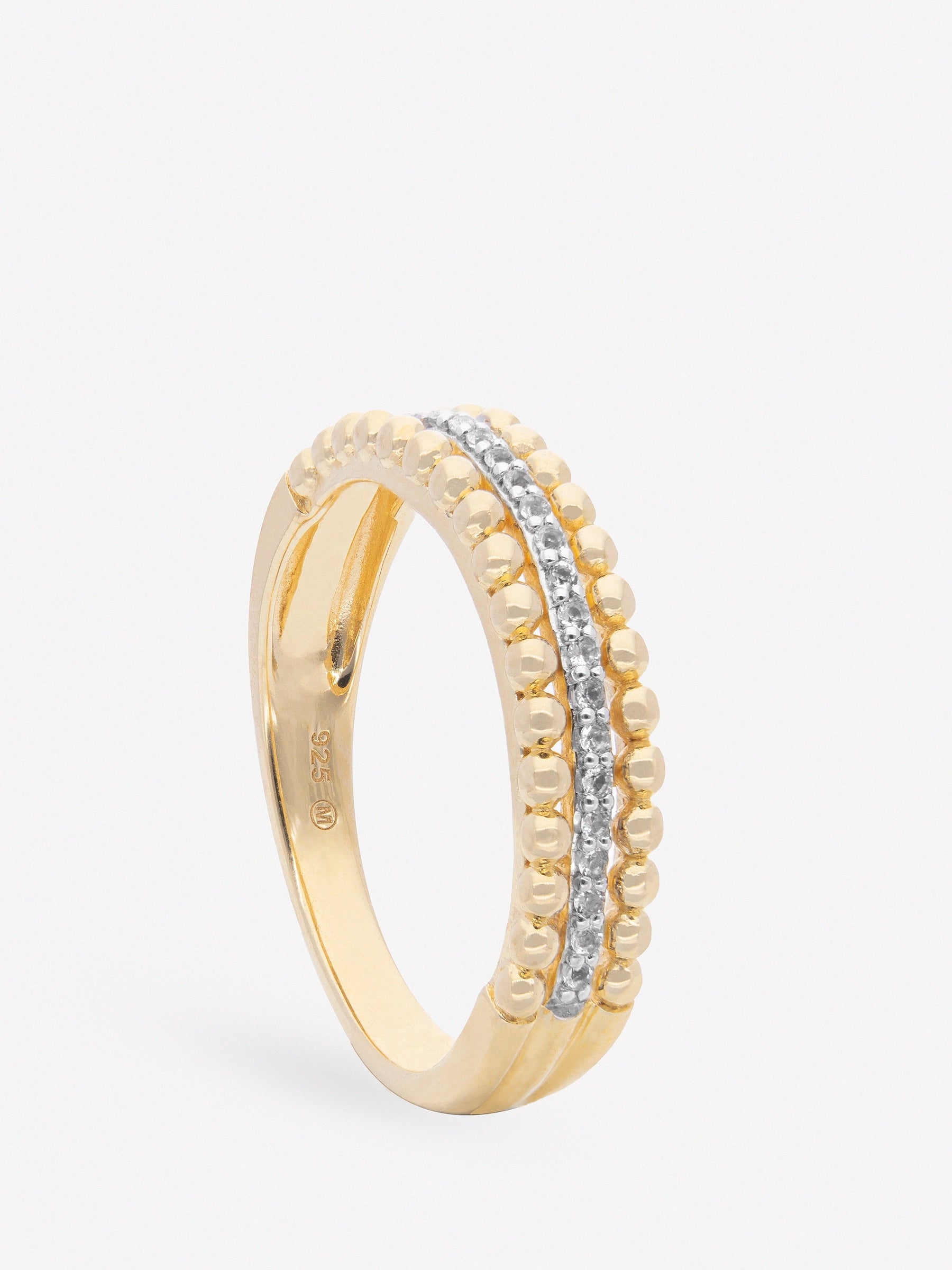 Anillo de plata triple con topacios blancos chapado en oro