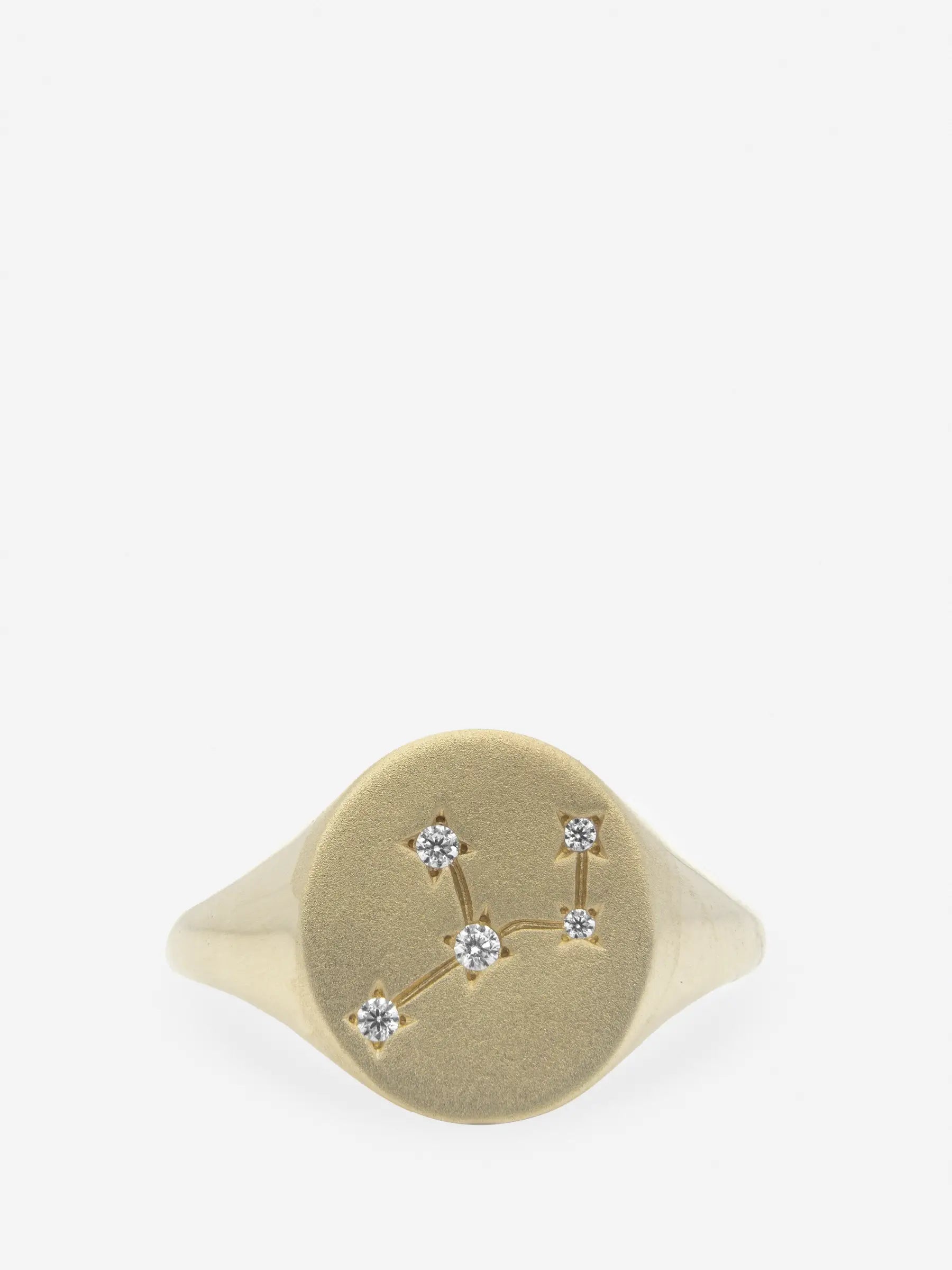 Anillo de plata esterlina con topacio blanco dibujando el signo zodiacal Virgo.