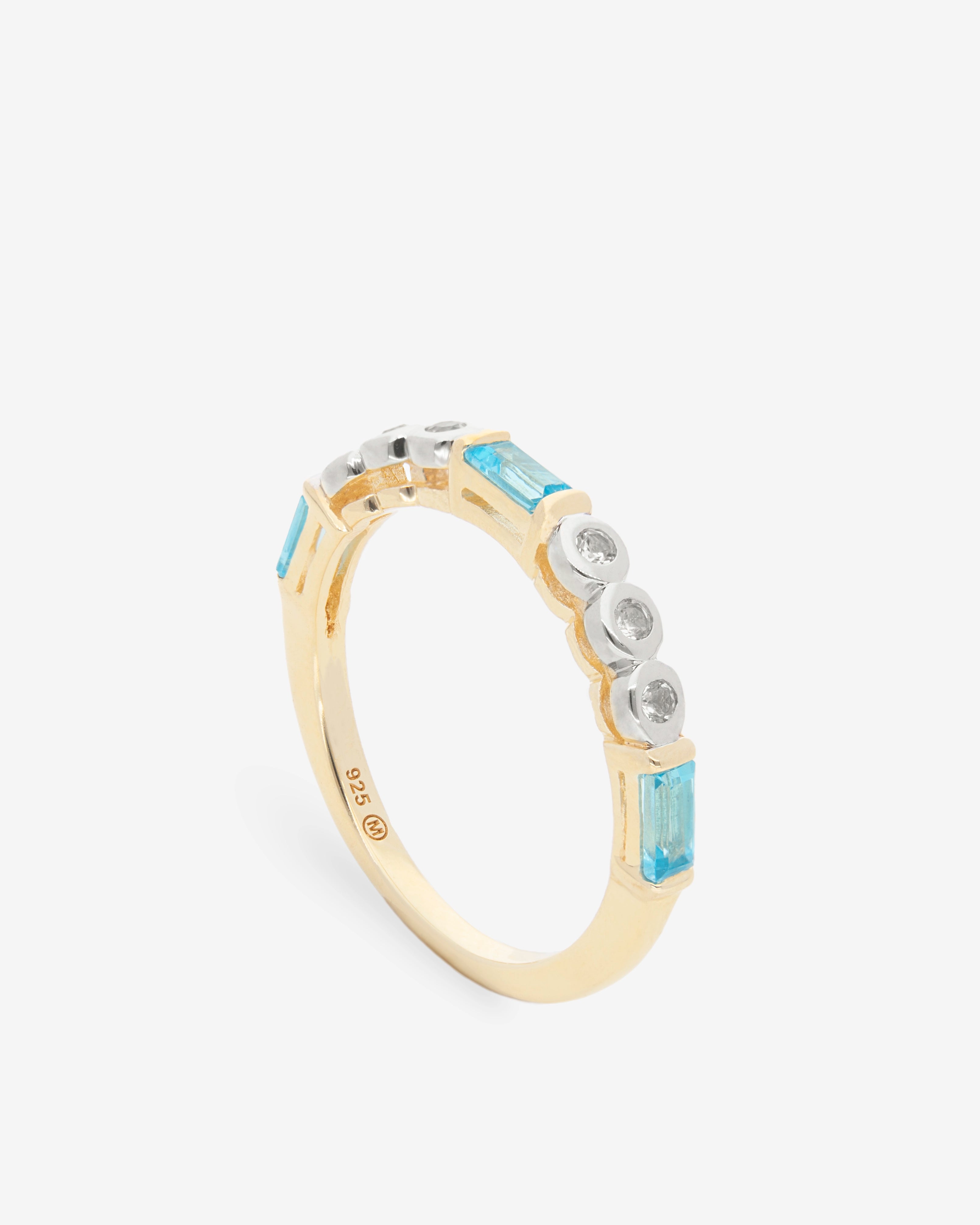 Anillo con topacio blanco y topacio azul en plata chapada en oro