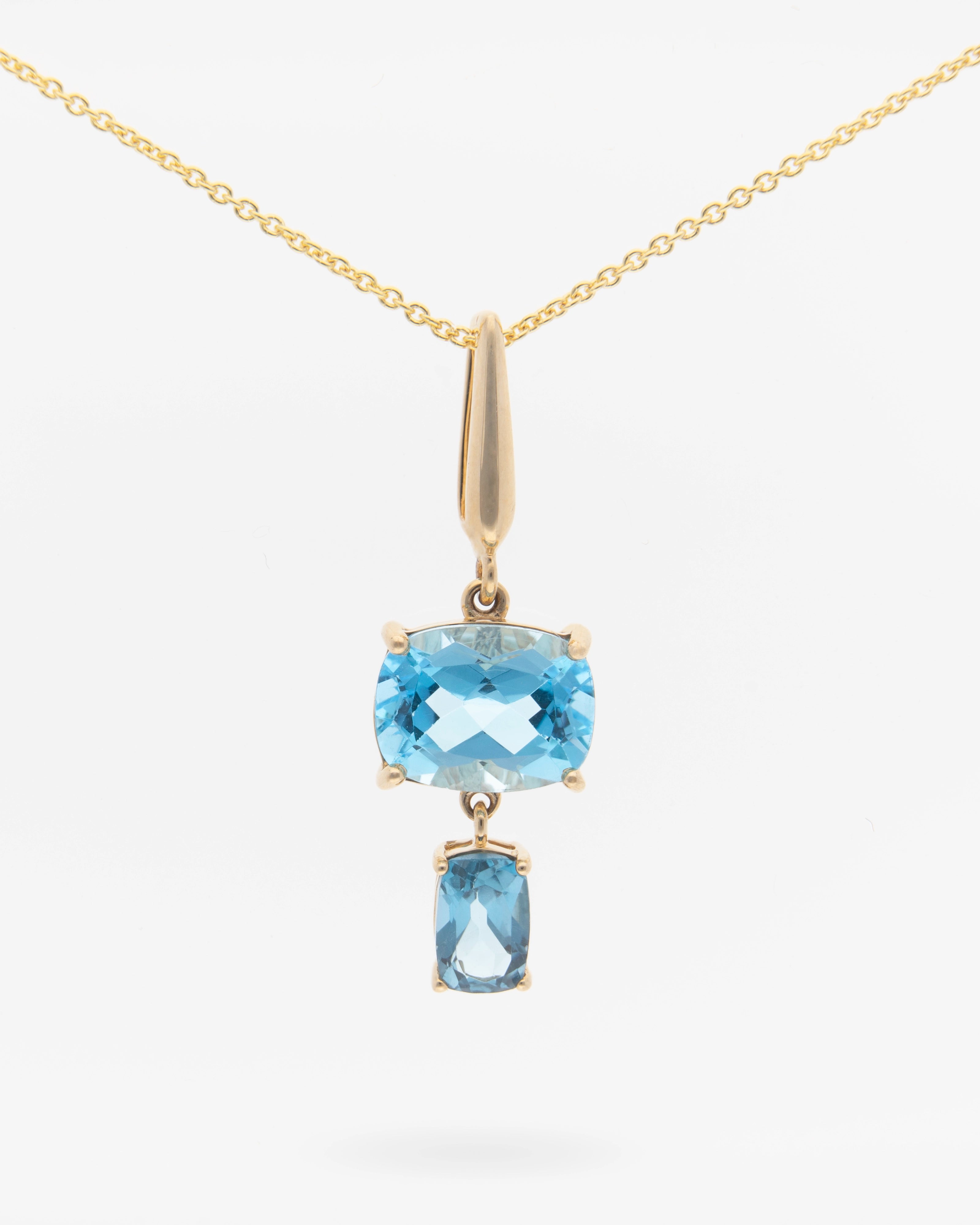 Colgante geométrico de Topacio Azul Suizo y London en Plata chapada en oro