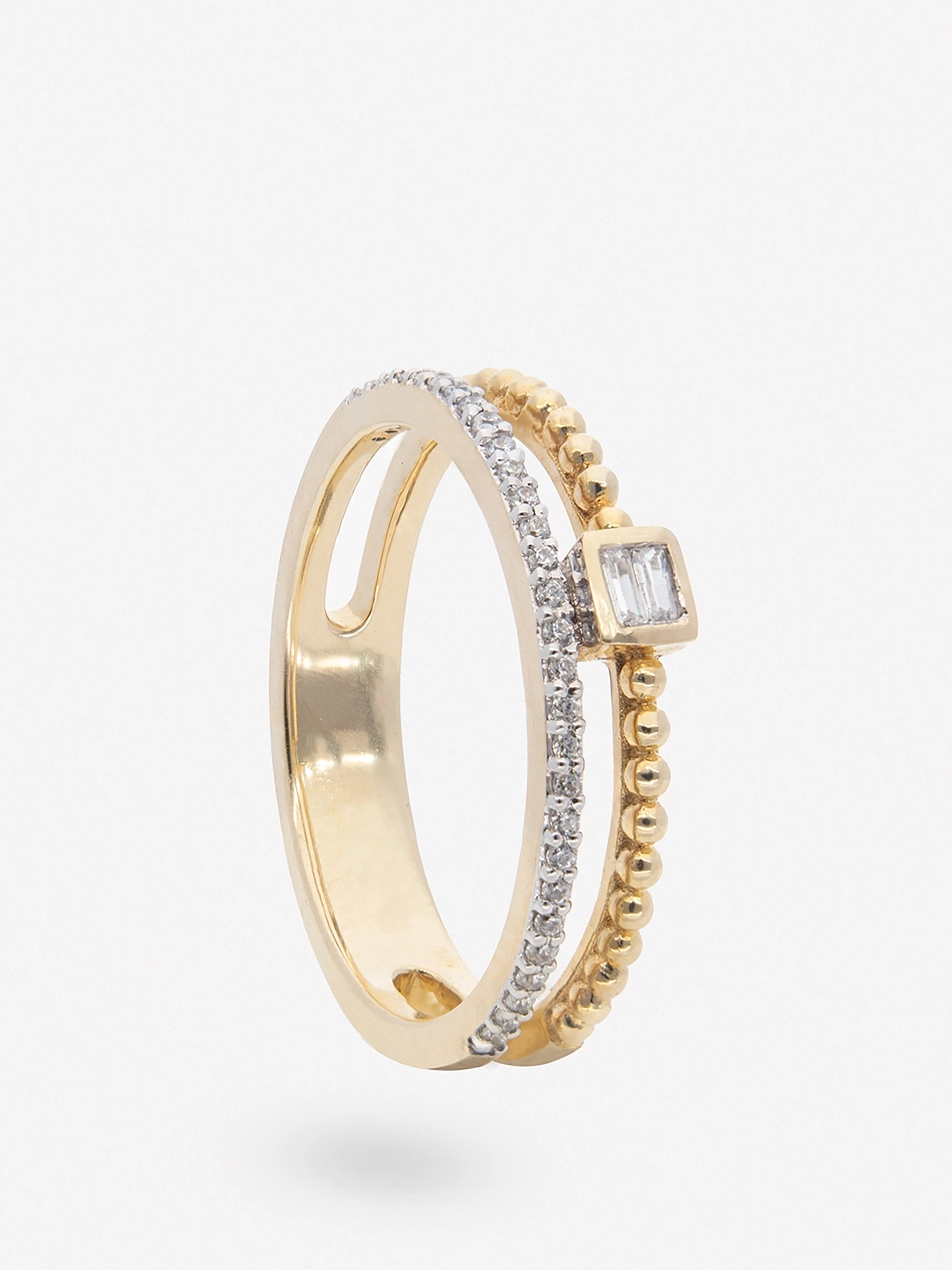 Anillo doble de topacios blancos y círculos hecho en plata chapado en oro