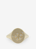 Anillo de plata esterlina con topacio blanco dibujando el signo zodiacal Acuario.