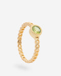 Anillo de plata chapado en oro con un peridoto circular en el centro
